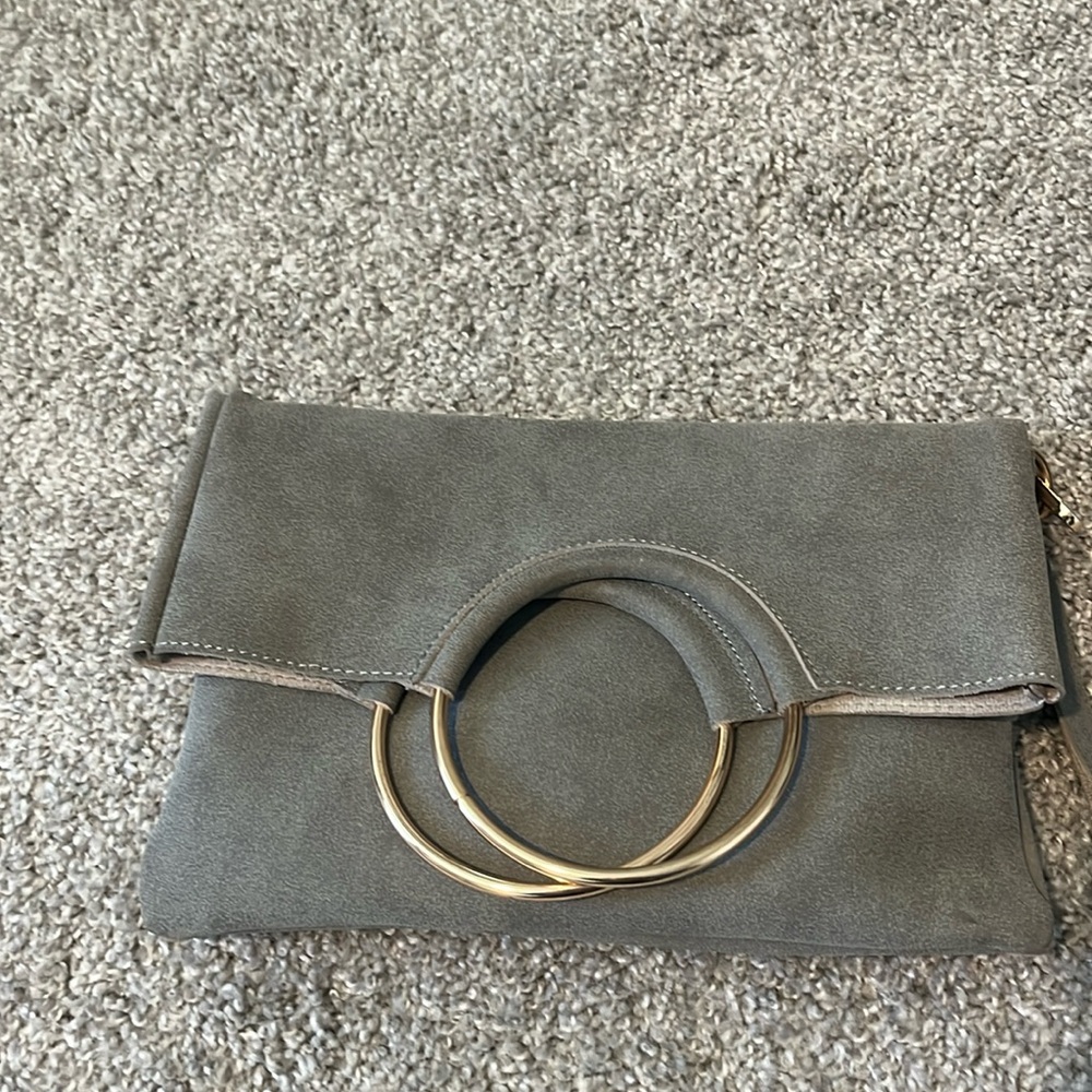 Grey clutch/crossbody bag. 
Make your offer and it’s yours!